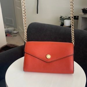 Small burnt orange Michael Kors purse